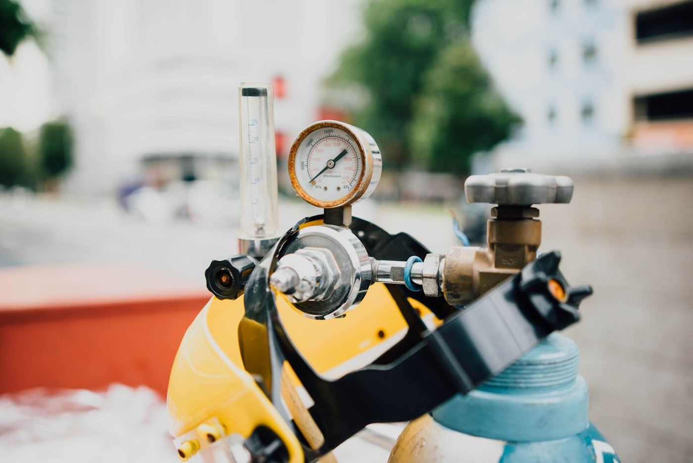 Close-up of a gas cylinder valve and regulator