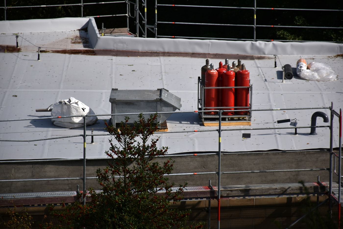 Bank of red fire suppression system cylinders