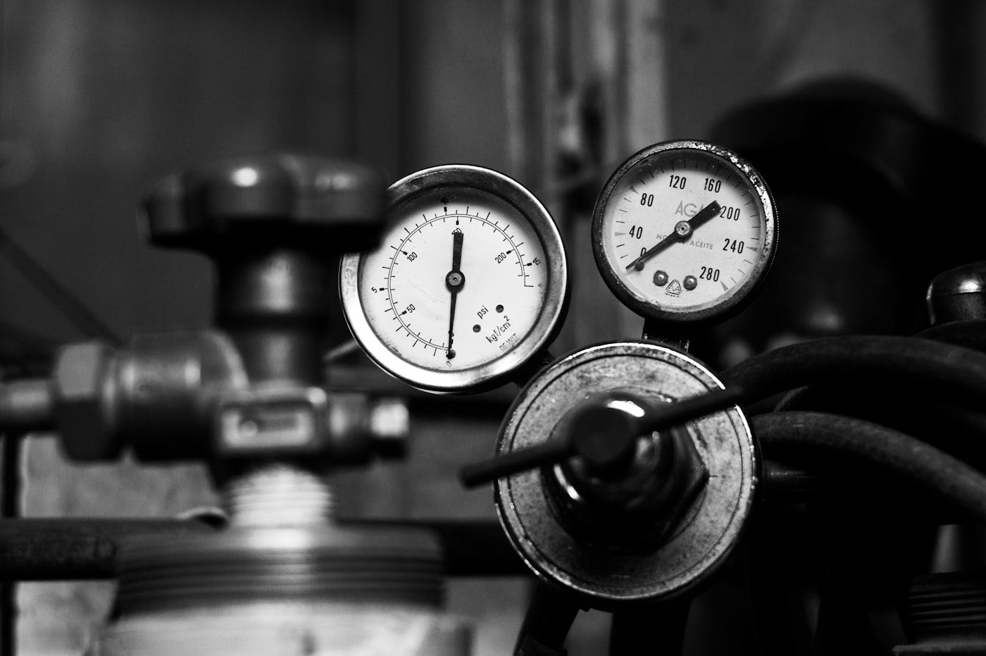 Pressure gauges and regulators on gas cylinders in a test bay